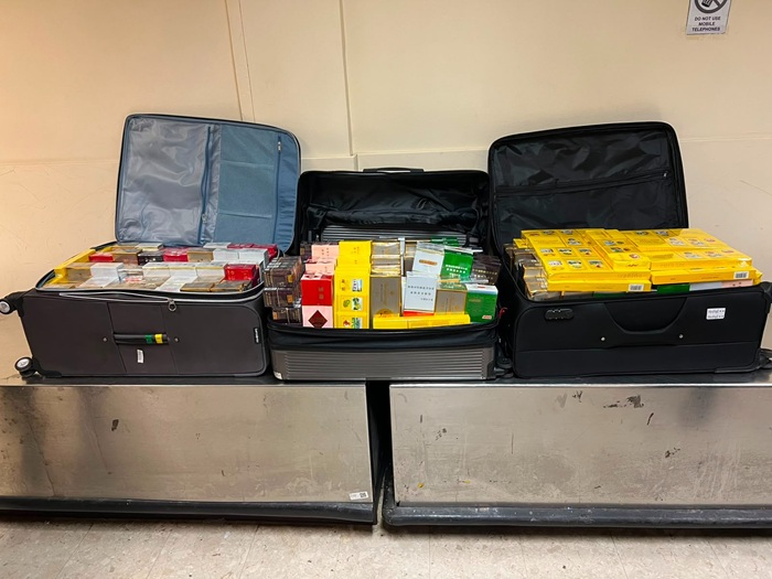 Indian National Held at BIA with 44,000 Smuggled Cigarettes